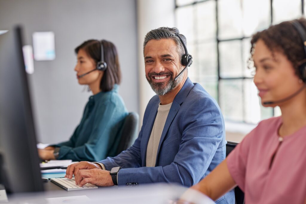 Portrait of professional call center agent looking at camera